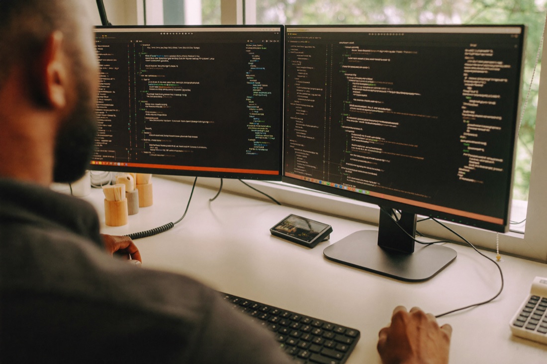 A developer building an interface on screen